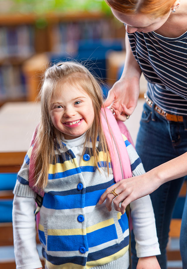 Down Syndrome Student with Teacher