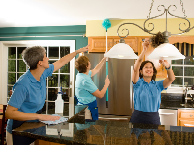 Three Maids Cleaning Kitchen  ©iStockphoto.com/bmcent1